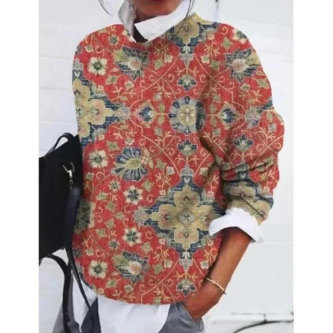 Women's floral knit sweater relaxed fit cozy everyday style with decorative floral motif