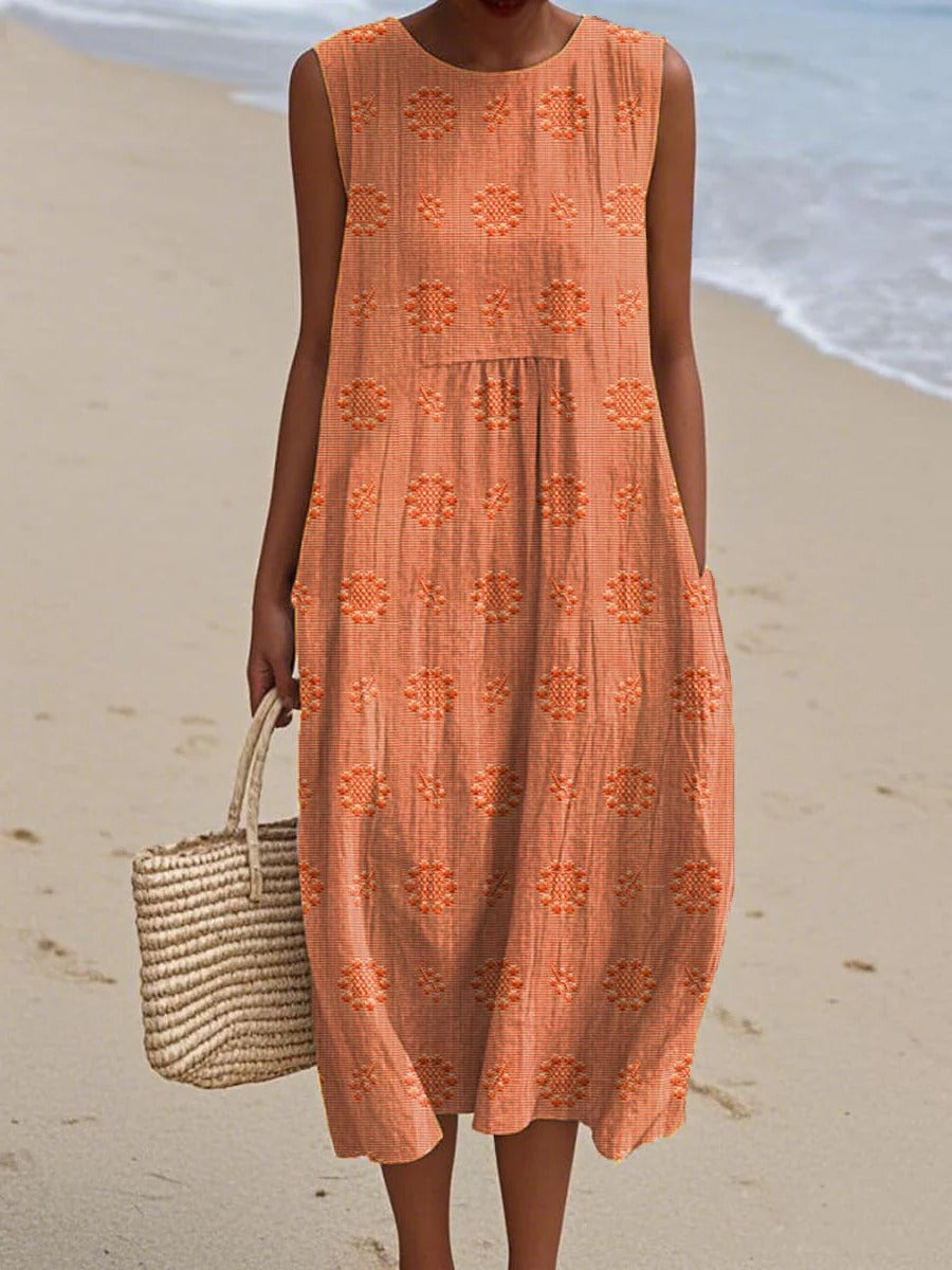 Women's sleeveless midi dress with gathered waist and subtle circular embroidery in a relaxed silhouette