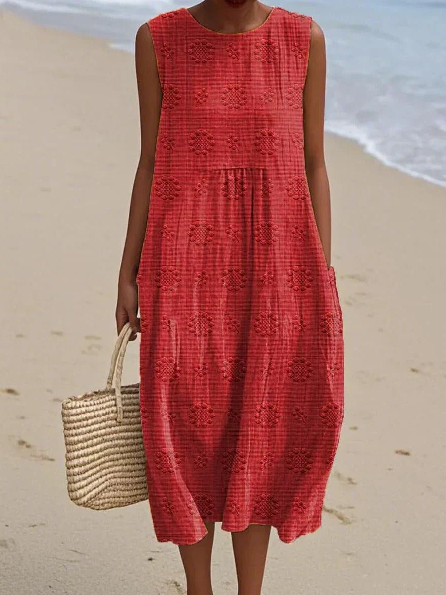 Women's sleeveless midi dress with gathered waist and subtle circular embroidery, relaxed casual silhouette