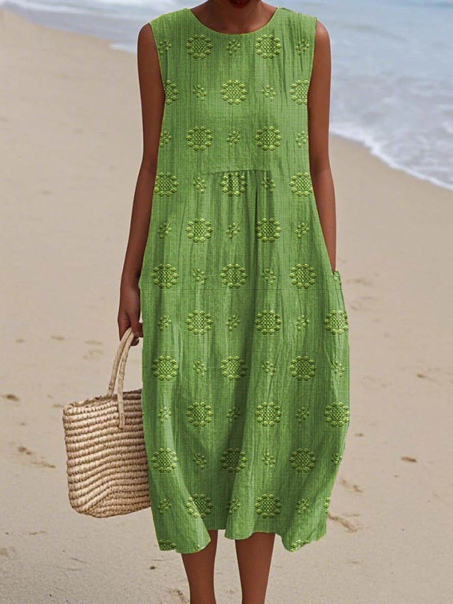 Women's sleeveless midi dress with gathered waist and subtle circular embroidery for effortless style