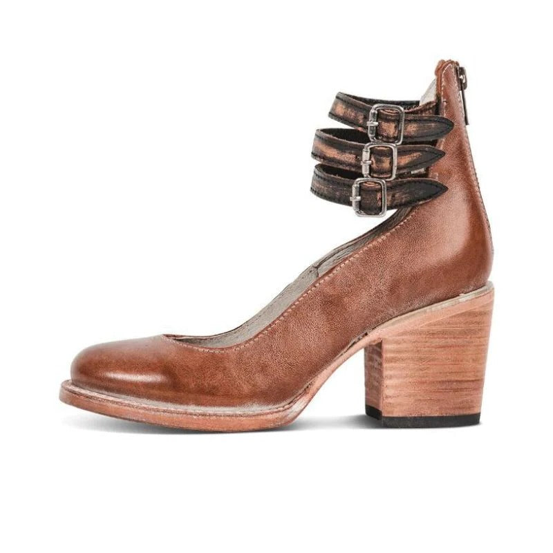 Women's black block heel ankle boots with back zipper closure and round-toe silhouette