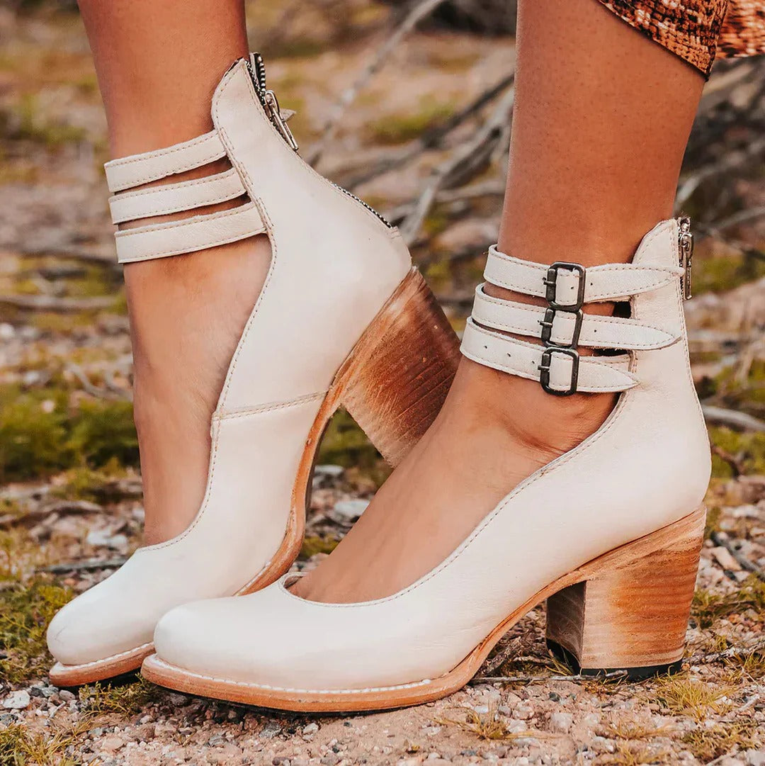Women's black block heel ankle boots with round toe and back zipper closure for versatile everyday wear