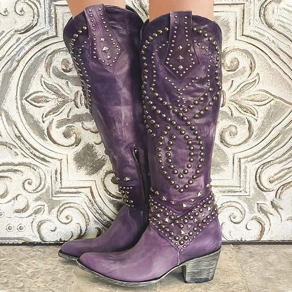 Women's brown leather knee-high western boots with pointed toe and studded accents