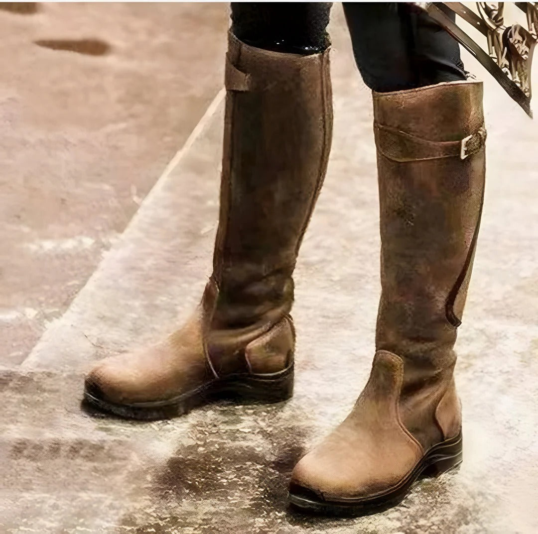 Women's waterproof knee-high boots in classic black with rugged grip sole for all-weather traction