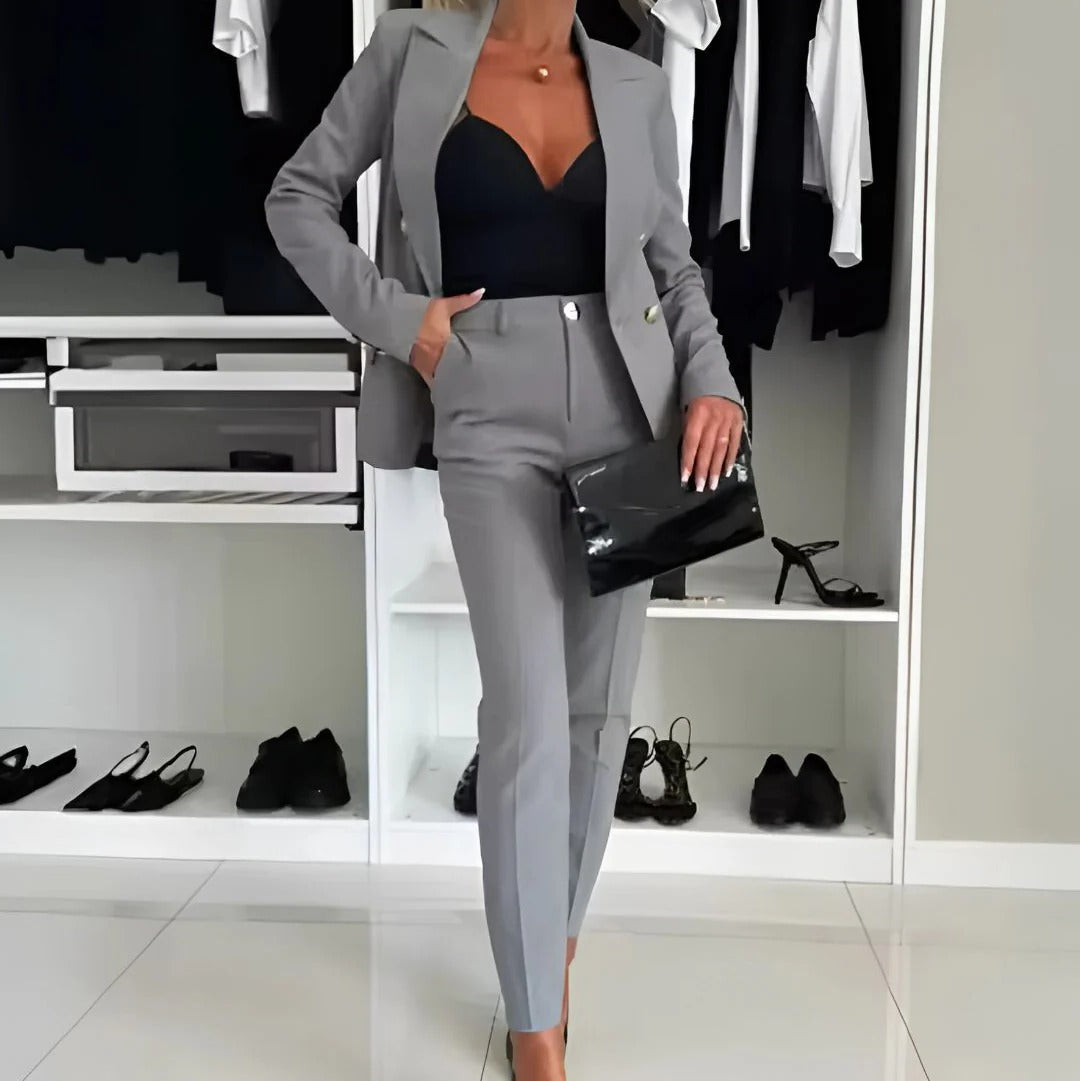 Women's black double-breasted blazer and straight-leg tailored trousers two-piece set with notched lapels
