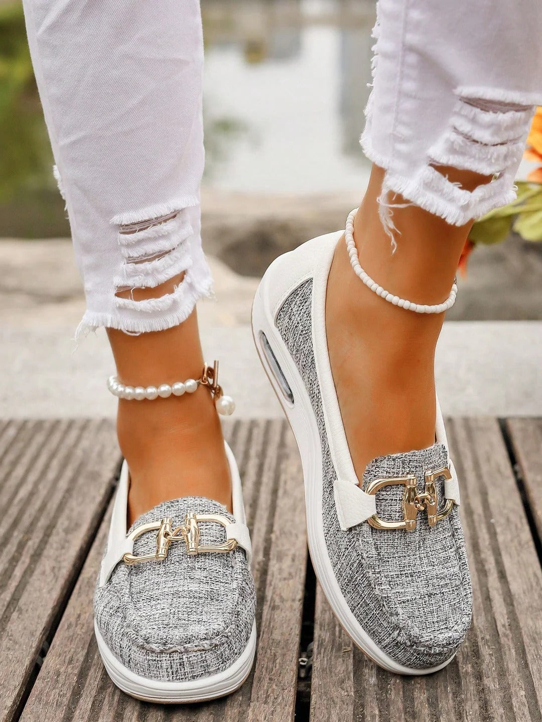 Women's slip-on loafers with gold buckle detail, flat wedge sole, polished silhouette for everyday wear