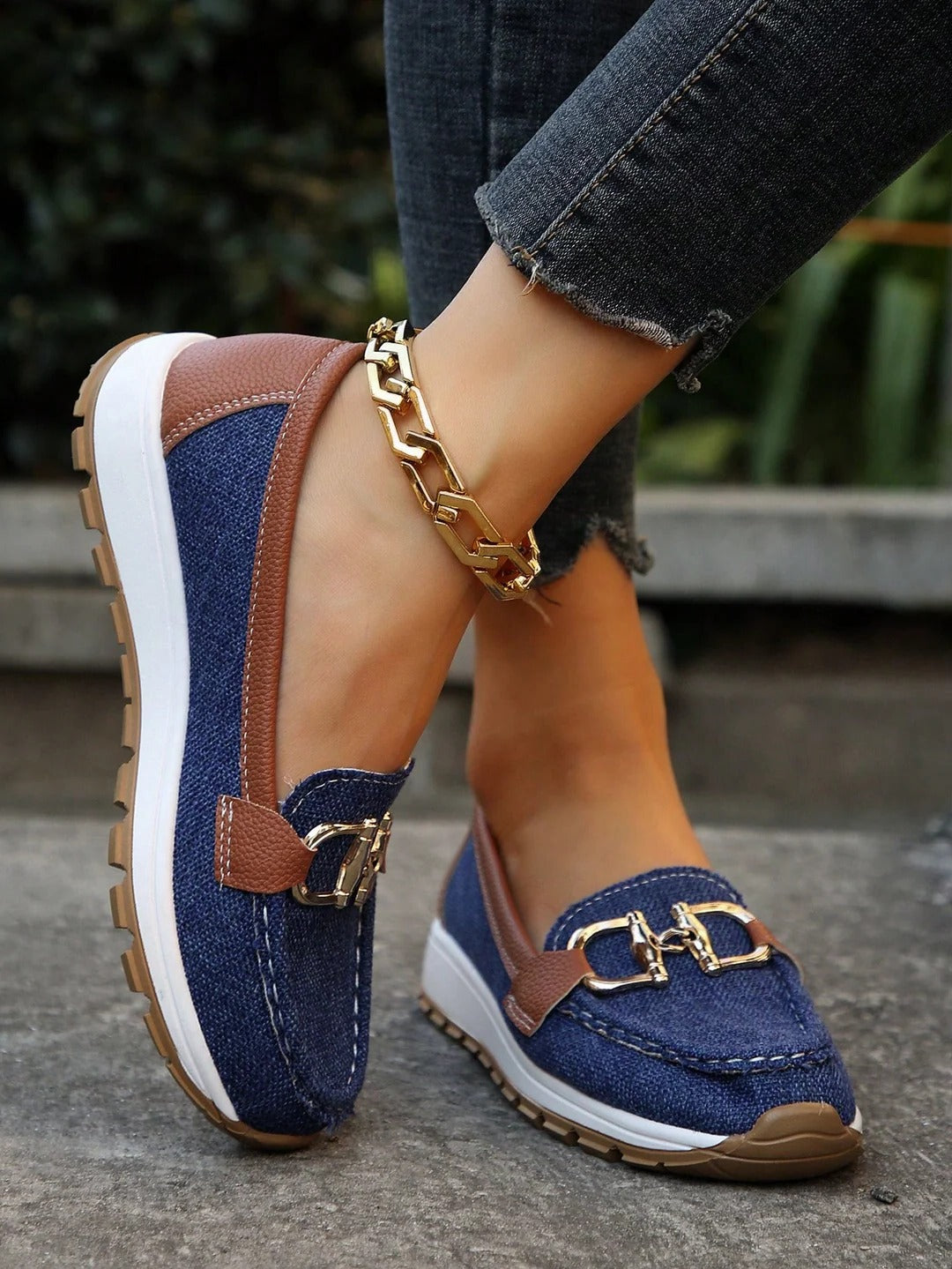 Women's slip-on loafers with gold buckle detail, flat wedge sole, polished silhouette for everyday wear