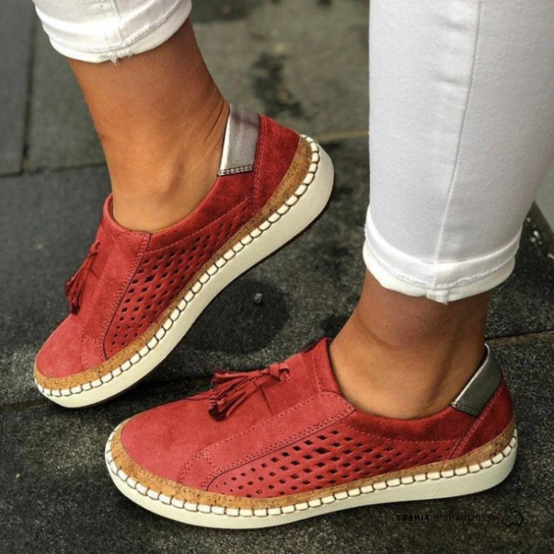 Women's casual slip-on shoes in neutral tone, lightweight breathable perforated upper, streamlined silhouette
