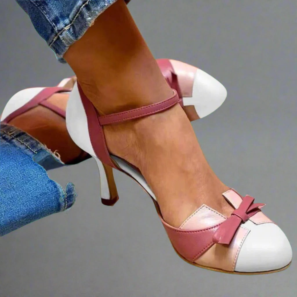 Women's comfort heeled sandals with breathable side cut-outs, cushioned comfort support, and polished everyday style