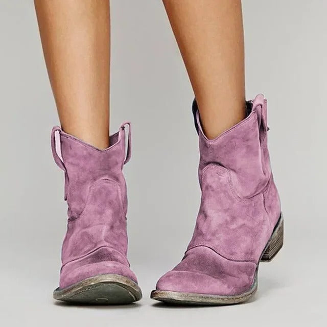 Women's western ankle boots in classic tan, pull-on cowboy silhouette with low block heel
