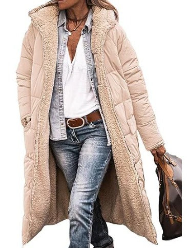 Women's longline quilted padded coat with attached hood in a sleek winter silhouette