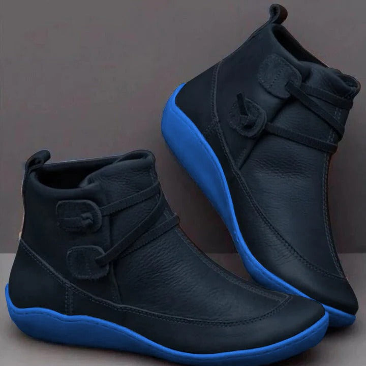 Waterproof ankle boots in classic design with water-resistant upper, durable sole, and sleek versatile silhouette