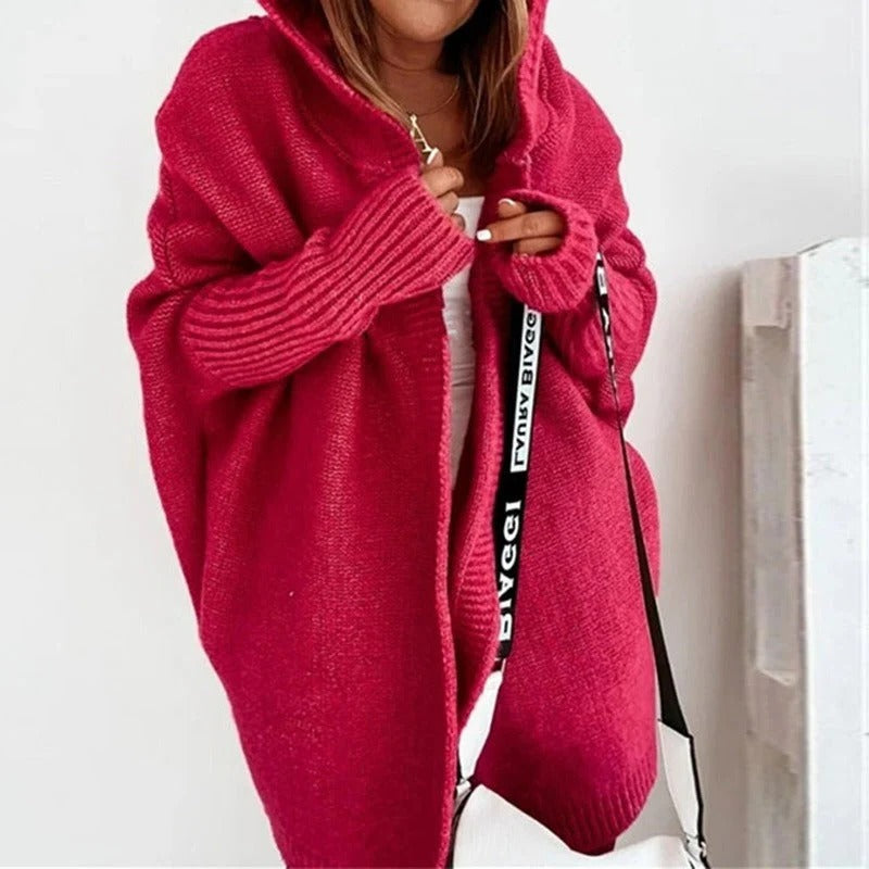 Cozy hooded knit cardigan in neutral tone, relaxed open-front silhouette with oversized hood