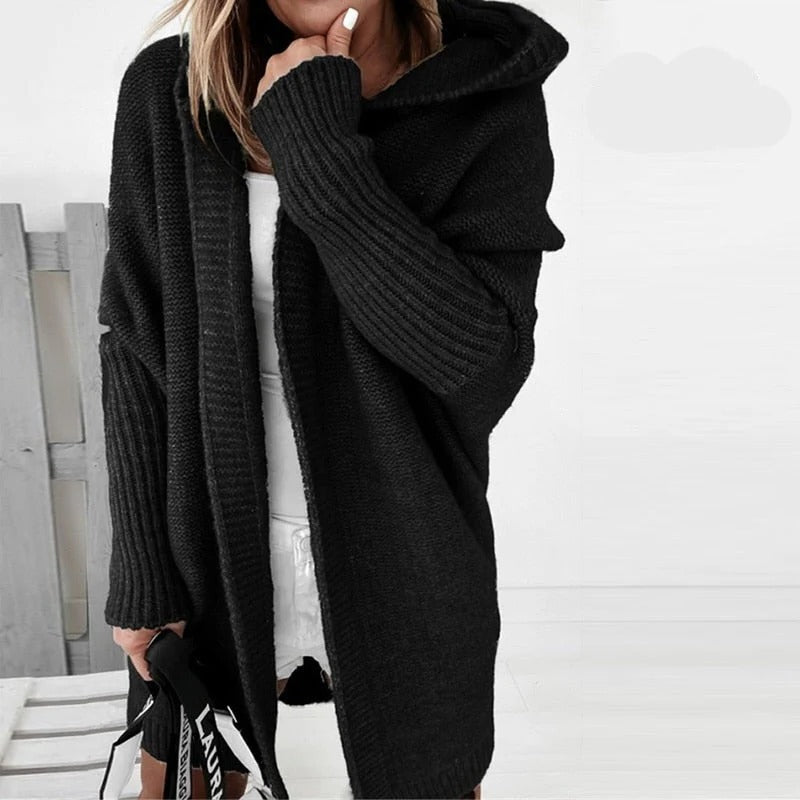 Beige hooded knit cardigan with relaxed silhouette and oversized open-front layering design
