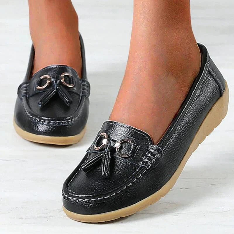 Women's orthopedic leather loafers with ergonomic insole, cushioned support, and timeless professional style