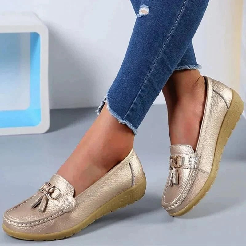 Women's orthopedic leather loafers with ergonomic insole, cushioned support, and timeless professional style