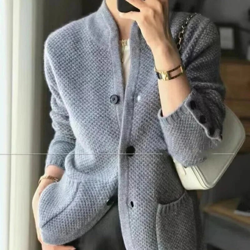 Classic waist-length knit cardigan with front button closure, regular fit for versatile everyday styling