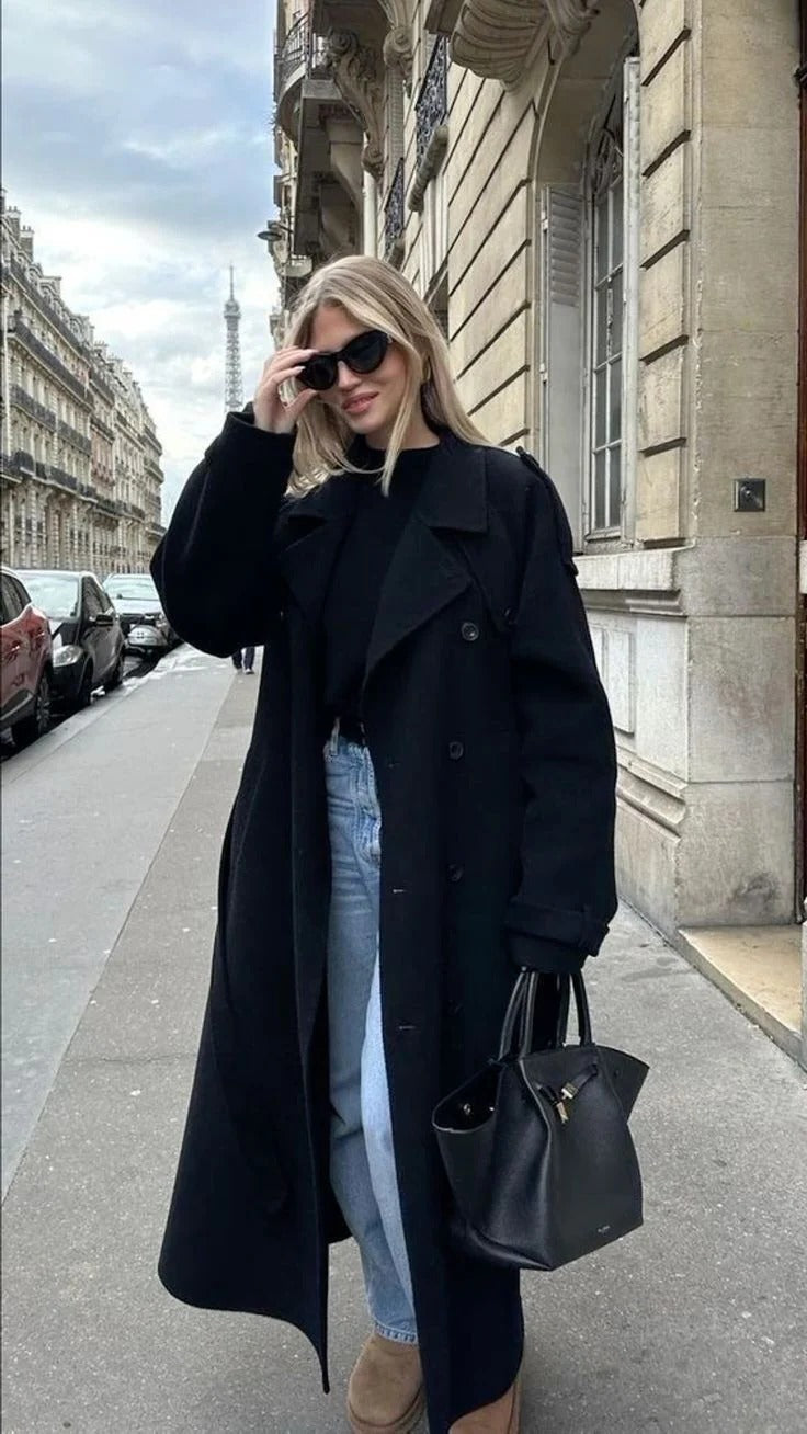 Beige double-breasted long trench coat with adjustable waist belt, classic city style