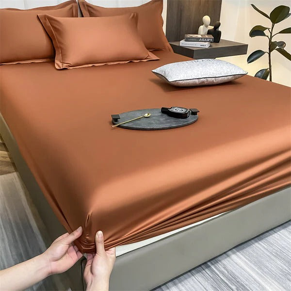 White fitted sheet set with elastic edges, soft breathable fabric, smooth finish for comfortable sleep