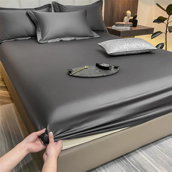 White fitted bed sheet with elastic edges, soft breathable fabric, smooth finish for comfortable sleep