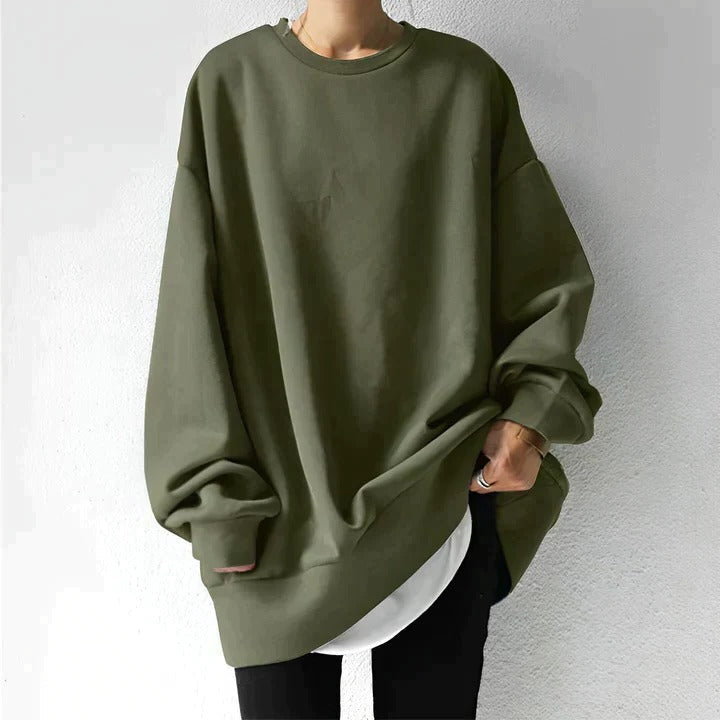 Plus-size women's oversized drapey sweater in neutral tones, relaxed cozy fit for curvy confidence