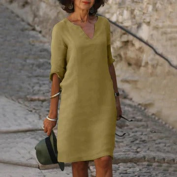 Women's loose fit casual dress in soft tones, lightweight breathable fabric with relaxed silhouette for warm weather