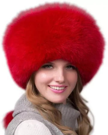 Cozy women's winter hat with integrated earmuffs, dense fur texture, full head coverage, cold-weather style