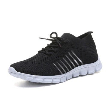 Women's white everyday sneakers with cushioned sole and modern low-top silhouette for all-day comfort