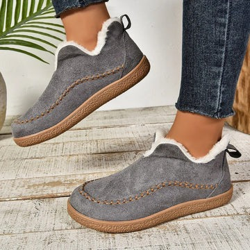 Women's winter comfort shoes with plush lining, non-slip rugged sole, and cushioned insulation for cold weather