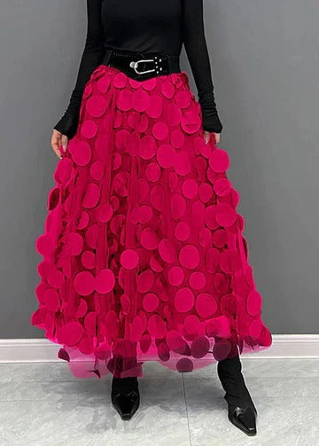 Women's polka dot tulle patchwork skirt with layered mesh overlay in elegant midi silhouette