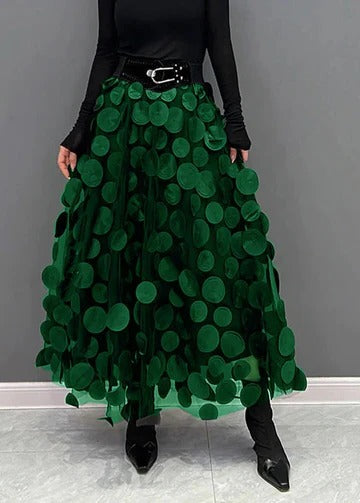 Women's polka dot tulle patchwork skirt with layered mesh overlay in elegant midi silhouette