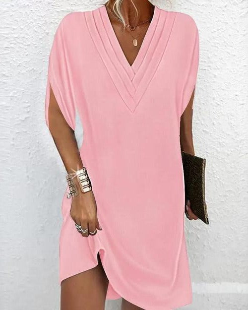 Straight mid-length dress with fluid drape, flattering timeless silhouette for versatile everyday elegance