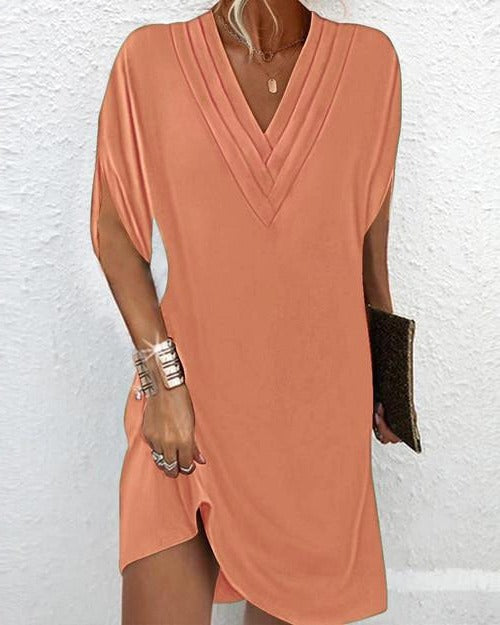 Straight mid-length dress with fluid drape and flattering lines, versatile minimalist silhouette