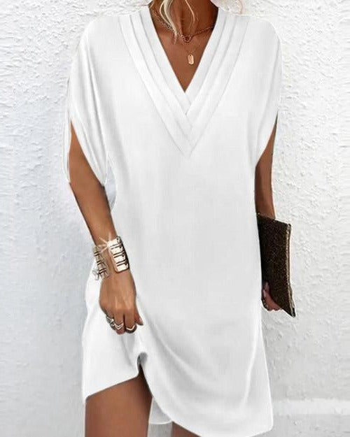 Straight mid-length dress with fluid drape and flattering lines, versatile silhouette for daily wear