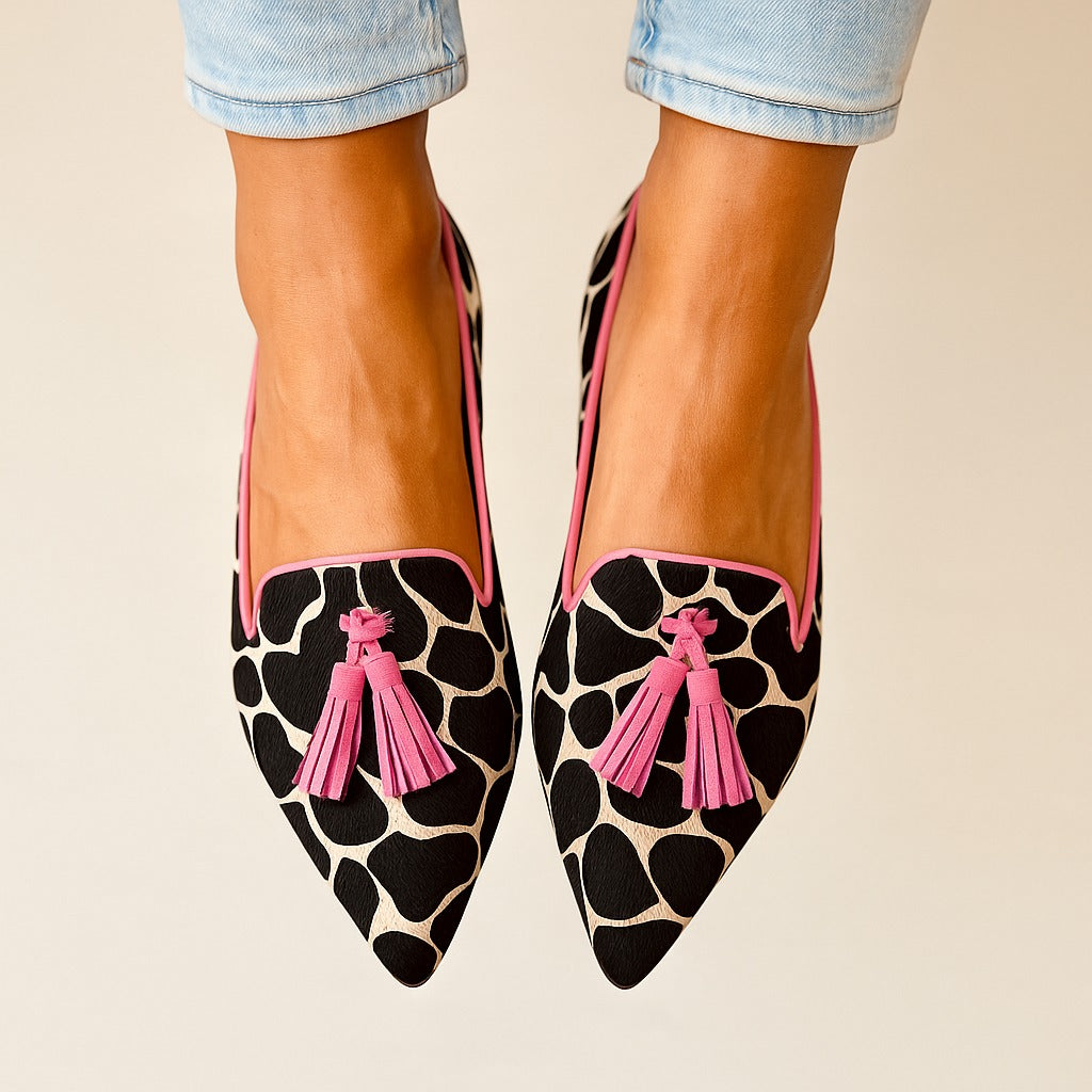 Elegant pointed toe loafers in classic neutral tone with sleek streamlined silhouette for work or casual wear