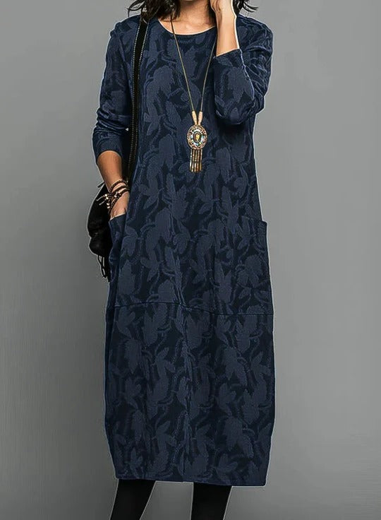 Women's winter midi dress with round neckline, relaxed silhouette, ideal for layering with tights and boots