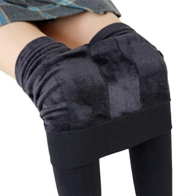 Black fleece-lined women's leggings in stretchy slim fit with cozy thermal interior for cold weather