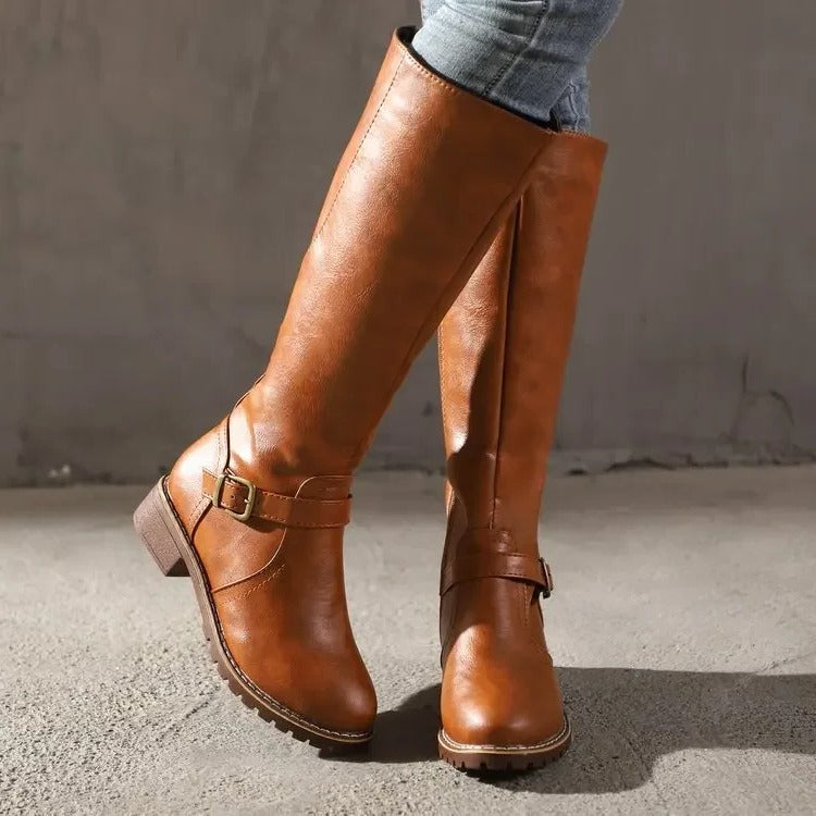 Women's mid-calf boots in smooth finish with structured silhouette and shaped toe for versatile wear