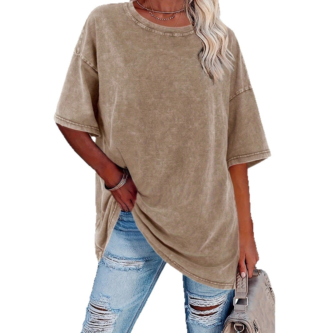Women's oversized vintage white t-shirt with relaxed fit and worn-in classic design