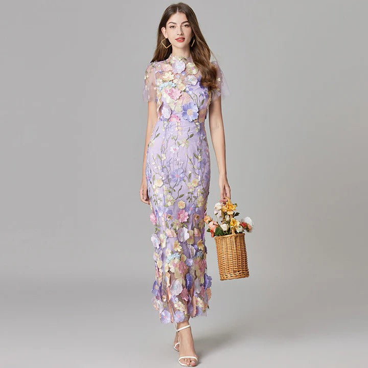 Women's sleeveless floral midi dress with elegant dimensional print, versatile for weddings and casual wear