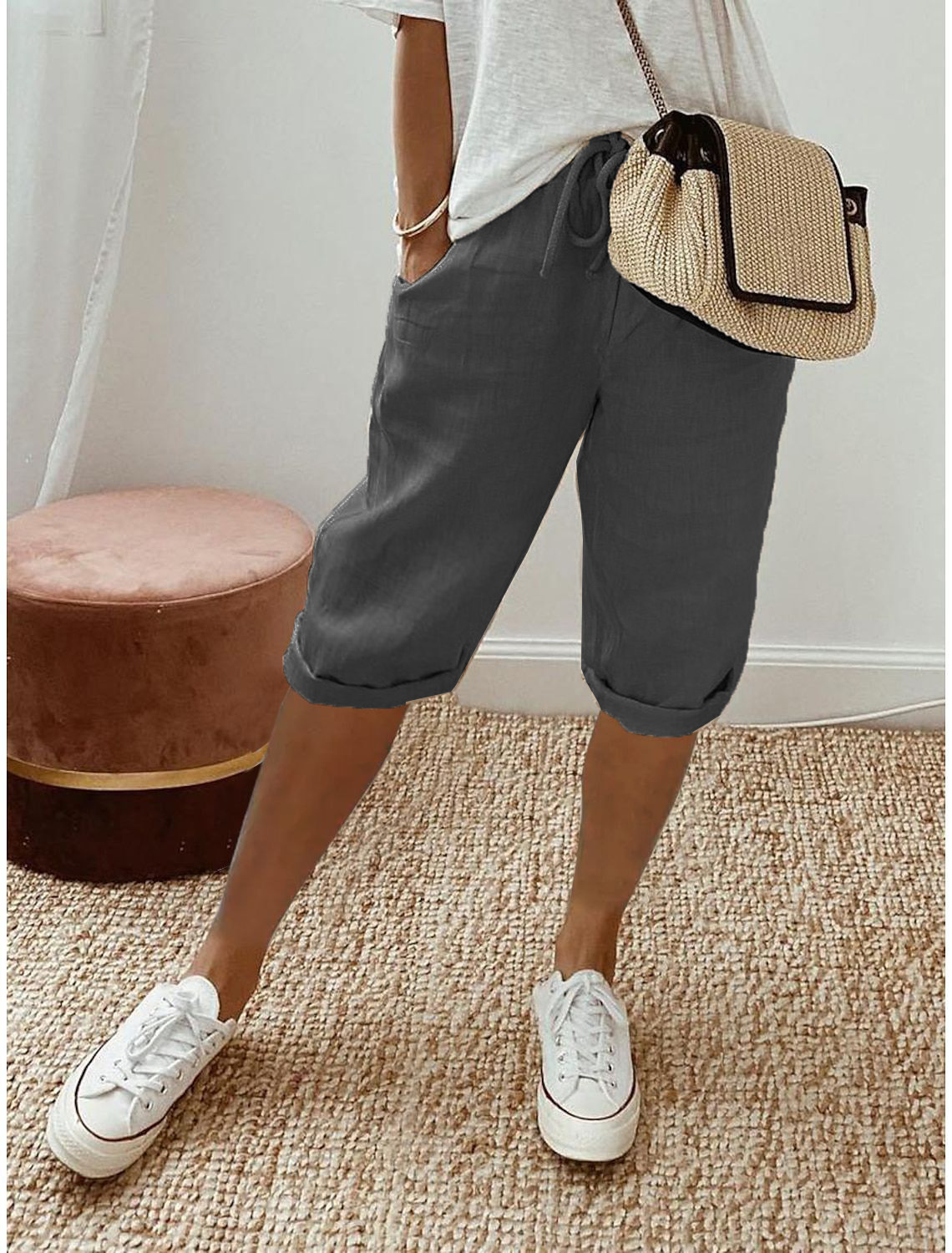 Women's relaxed capri pants in neutral tone, mid-calf cut with stretchy elastic waistband