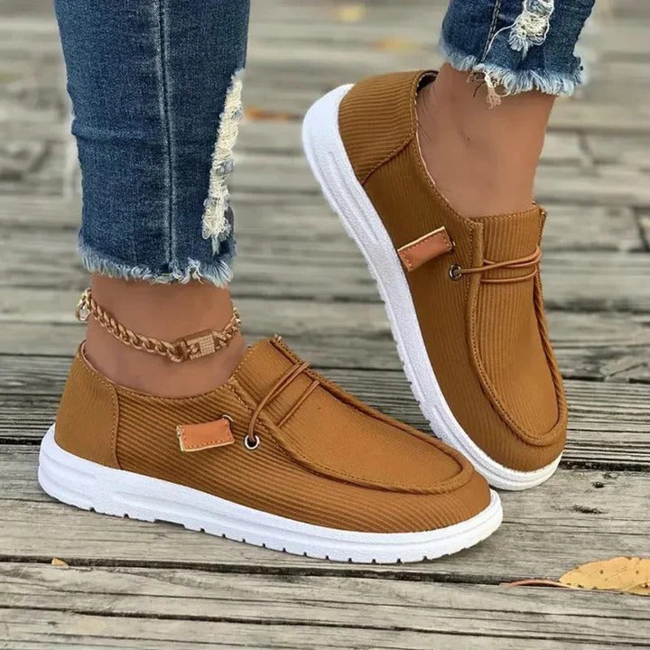 Women's slip-on hiking boots in neutral tones, easy-wear silhouette with relaxed fit and all-day support