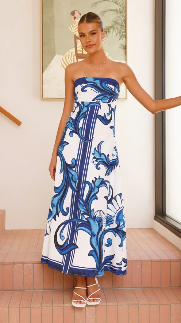 Women's vintage-inspired printed wedding guest dress with flattering modern silhouette and graceful drape