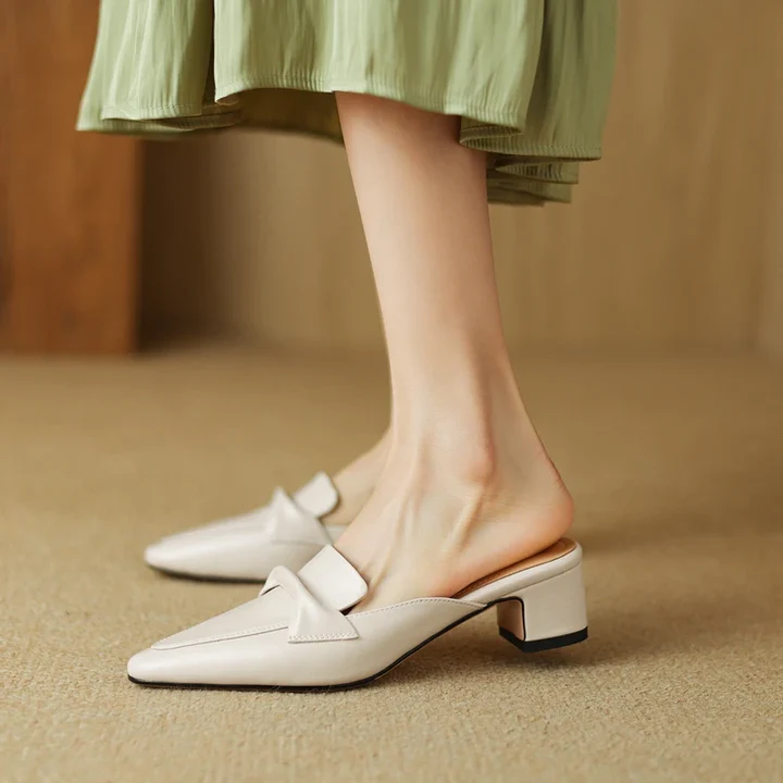 Palieri genuine leather mules pointed toe vintage-inspired silhouette with refined stitching details
