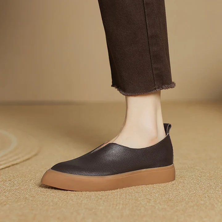 Maeva women's black leather loafers with minimal platform silhouette and smooth refined finish