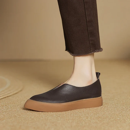 Maeva women's black leather loafers with minimal platform silhouette and smooth refined finish