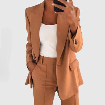 Women's tailored blazer and pants set in classic cut with structured fit and polished two-piece design