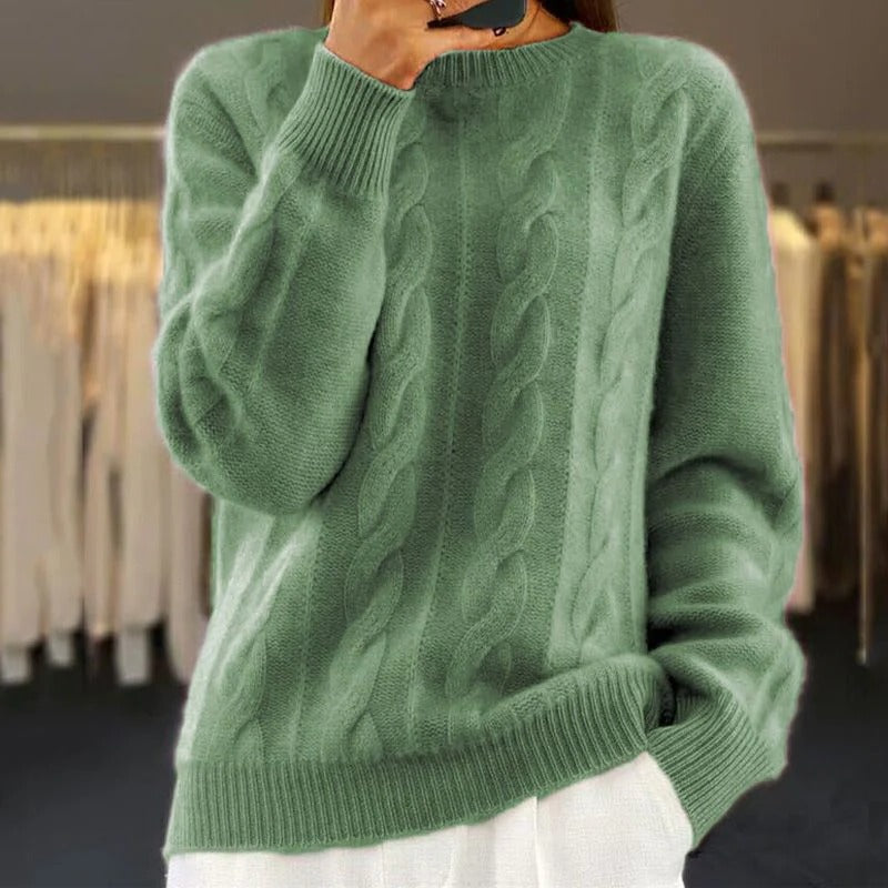 Women's chunky cable knit sweater cozy warm structured silhouette cold season knitwear