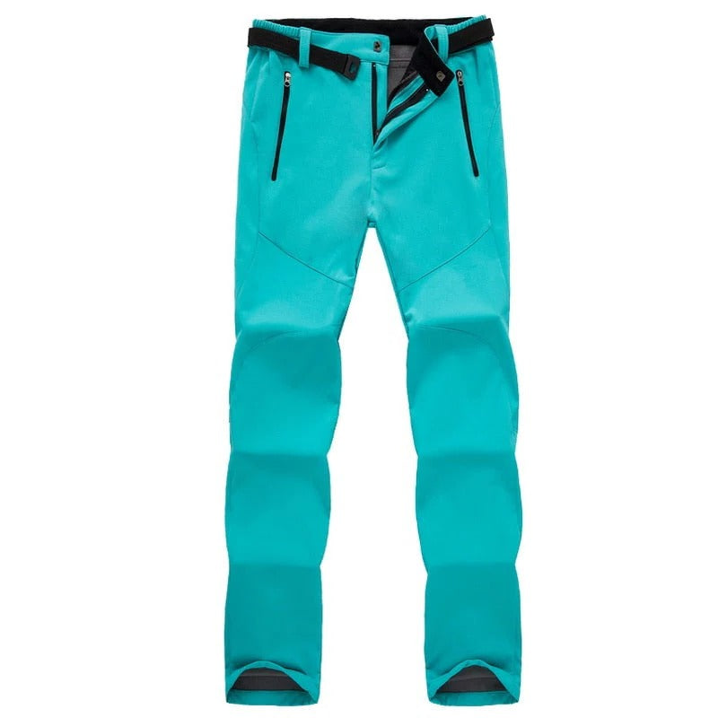 Women's outdoor hiking pants in neutral tone, straight cut with weather-resistant design for trekking