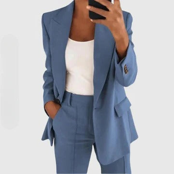 Women's tailored blazer and pants set in classic cut with structured silhouette and coordinated two-piece design
